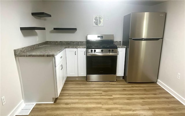 232 Almay Rd, Greece, NY 14616 - kitchen featuring stainless steel appliances, open shelves, white cabinets, and light wood-style flooring