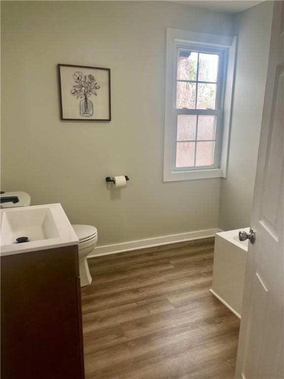232 Almay Rd, Greece, NY 14616 - half bathroom featuring vanity and wood finished floors