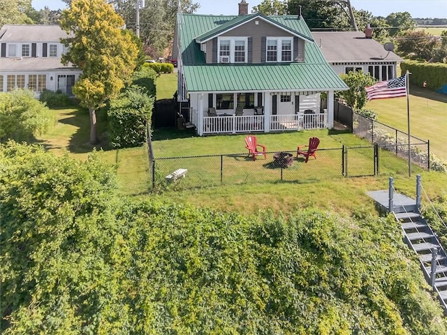 5631 W Blf, Newfane, NY 14126 - view of front of property with a chimney, a metal roof, and a porch