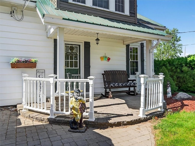 5631 W Blf, Newfane, NY 14126 - property entrance with covered porch and a metal roof