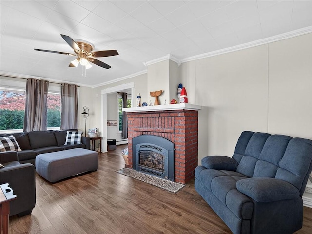 5631 W Blf, Newfane, NY 14126 - living room featuring crown molding, ceiling fan, wood finished floors, a fireplace, and a baseboard heating unit