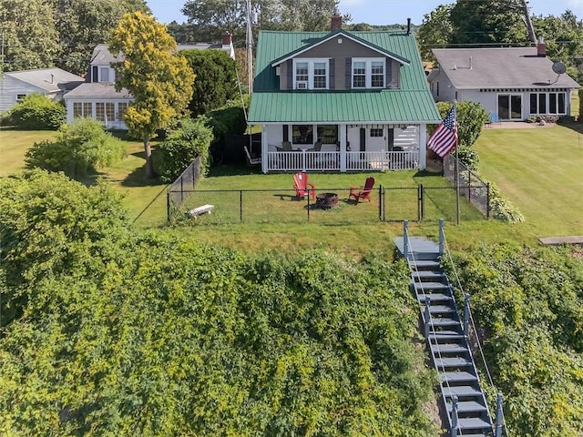 5631 W Blf, Newfane, NY 14126 - view of front of house with a porch, a chimney, stairway, and a metal roof