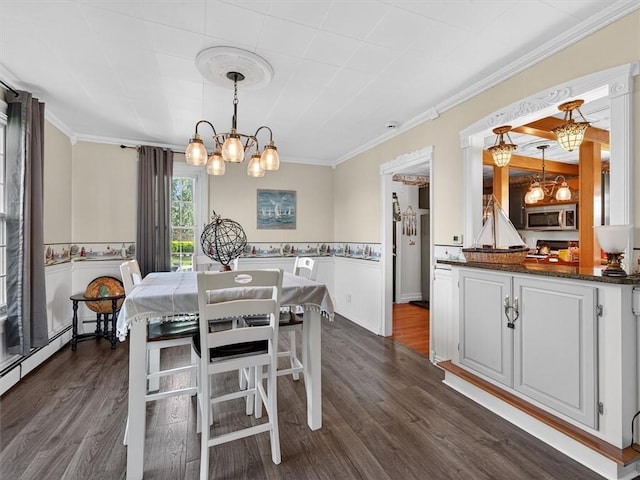 5631 W Blf, Newfane, NY 14126 - dining area with a chandelier, dark wood-style floors, ornamental molding, wainscoting, and baseboard heating