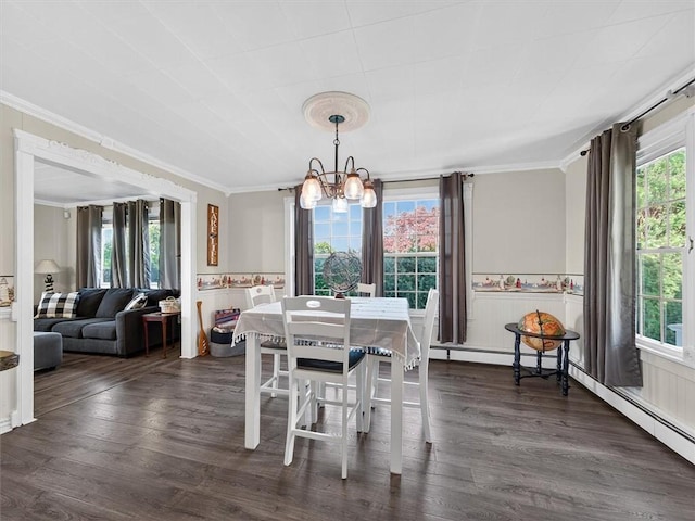5631 W Blf, Newfane, NY 14126 - dining room with crown molding, a chandelier, dark wood finished floors, and wainscoting