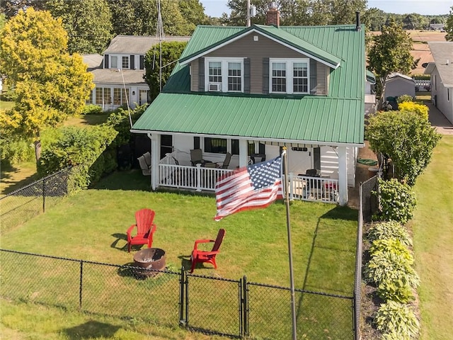 5631 W Blf, Newfane, NY 14126 - view of front of property featuring a metal roof, a fenced backyard, and a chimney