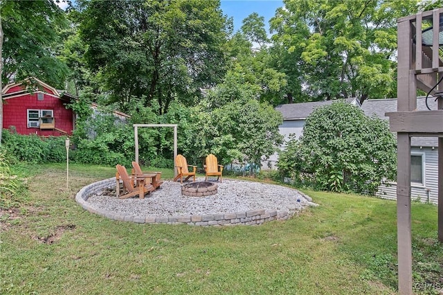 229 Gillespie Ave, Camillus, NY 13219 - view of grassy yard featuring a fire pit