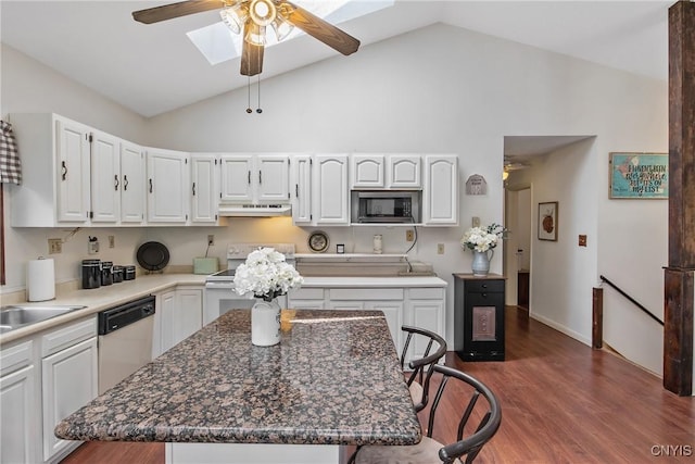 229 Gillespie Ave, Camillus, NY 13219 - kitchen featuring electric range, built in microwave, stainless steel dishwasher, a ceiling fan, and under cabinet range hood