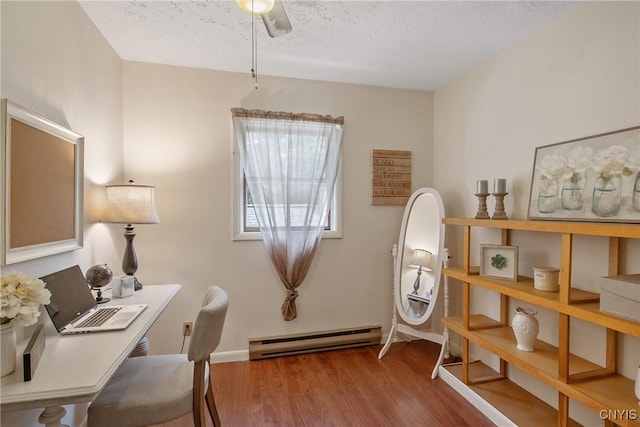 229 Gillespie Ave, Camillus, NY 13219 - office space with a baseboard heating unit, a ceiling fan, wood finished floors, and a textured ceiling
