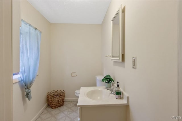 229 Gillespie Ave, Camillus, NY 13219 - bathroom with toilet and vanity