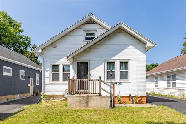 82 Barnard St, Greece, NY 14616 - view of front of home with a front lawn