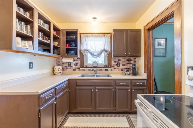 82 Barnard St, Greece, NY 14616 - kitchen featuring electric range, tasteful backsplash, light countertops, and open shelves