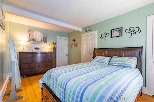 82 Barnard St, Greece, NY 14616 - bedroom featuring light wood finished floors and beam ceiling