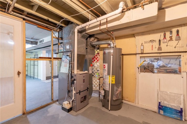 82 Barnard St, Greece, NY 14616 - utility room featuring water heater and heating unit