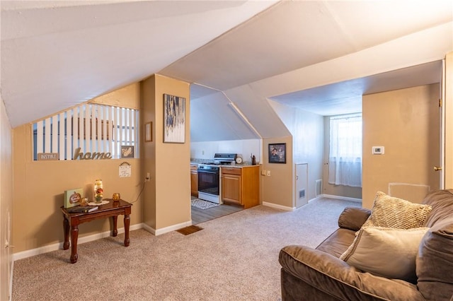 82 Barnard St, Greece, NY 14616 - living area featuring light colored carpet and vaulted ceiling