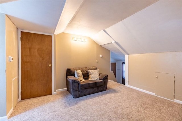 82 Barnard St, Greece, NY 14616 - living area featuring carpet floors and vaulted ceiling