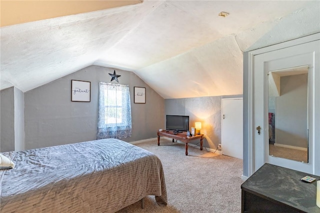 82 Barnard St, Greece, NY 14616 - carpeted bedroom with vaulted ceiling and baseboards