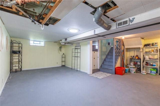 82 Barnard St, Greece, NY 14616 - below grade area with stairs and baseboards