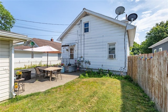 82 Barnard St, Greece, NY 14616 - rear view of property with a patio