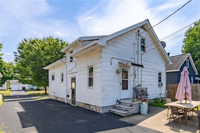 82 Barnard St, Greece, NY 14616 - back of property featuring a patio area