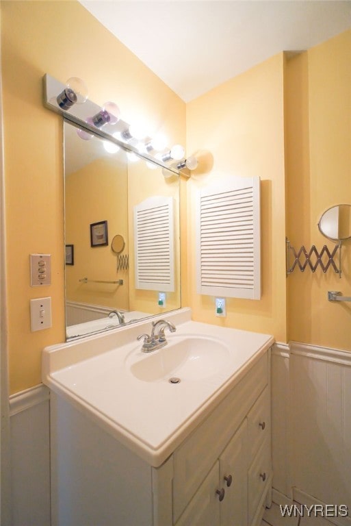 1104 Netherton Ct, Amherst, NY 14051 - bathroom featuring vanity and wainscoting