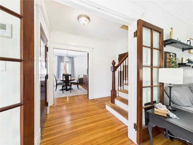 1010 W Main St, Smethport Boro, PA 16749 - corridor with stairs, light wood-style floors, and crown molding