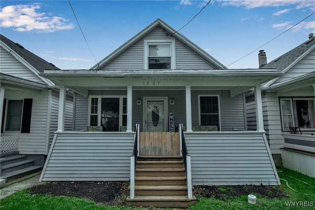 1007 87th St, Niagara Falls, NY 14304 - view of front of property featuring a porch