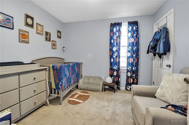 1007 87th St, Niagara Falls, NY 14304 - bedroom with carpet floors and baseboards