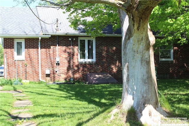 410 Chestnut St, Pomfret, NY 14063 - back of property with a yard and brick siding