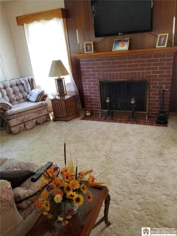 410 Chestnut St, Pomfret, NY 14063 - carpeted living room with a brick fireplace