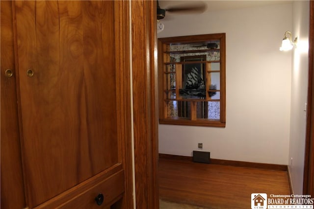 410 Chestnut St, Pomfret, NY 14063 - hallway with wood finished floors and baseboards