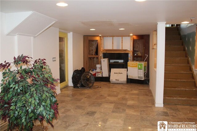 410 Chestnut St, Pomfret, NY 14063 - below grade area featuring stairway and recessed lighting