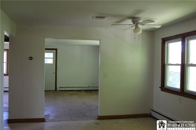 410 Chestnut St, Pomfret, NY 14063 - spare room with baseboard heating and a ceiling fan