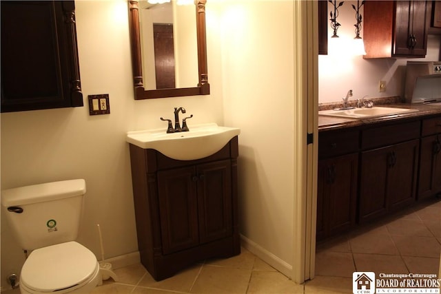 410 Chestnut St, Pomfret, NY 14063 - bathroom with vanity and tile patterned flooring