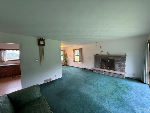 2359 Sands Rd, Camillus, NY 13031 - unfurnished living room featuring carpet and a brick fireplace