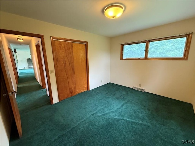 2359 Sands Rd, Camillus, NY 13031 - unfurnished bedroom featuring carpet flooring and a closet