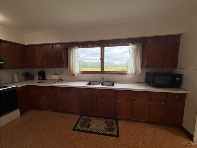 2359 Sands Rd, Camillus, NY 13031 - kitchen featuring black microwave, white electric range, light countertops, and dark brown cabinetry