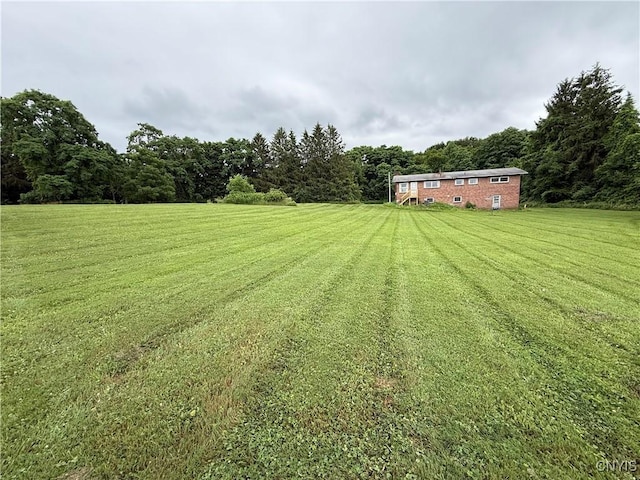 2359 Sands Rd, Camillus, NY 13031 - view of green lawn with a forest view and a view of rural / pastoral area