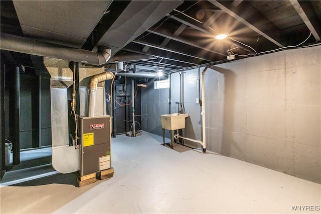 539 Windermere Blvd, Amherst, NY 14226 - unfinished basement with a sink and heating unit
