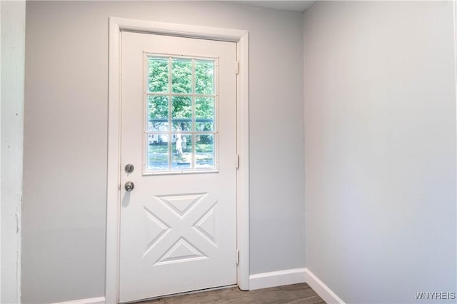 539 Windermere Blvd, Amherst, NY 14226 - doorway to outside featuring baseboards and wood finished floors