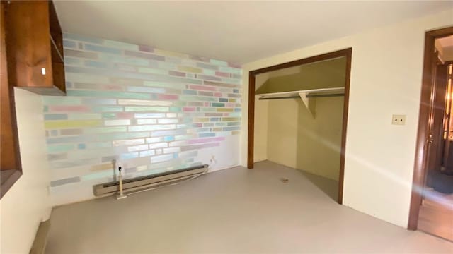 1221 Garden Ln, Middlesex, NY 14507 - unfurnished bedroom featuring baseboard heating and a closet