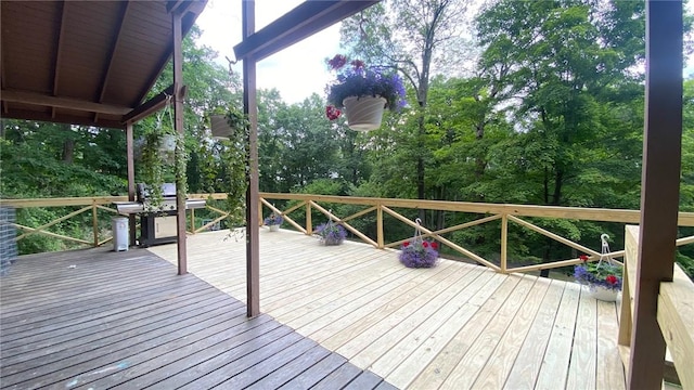 1221 Garden Ln, Middlesex, NY 14507 - wooden terrace featuring view of wooded area