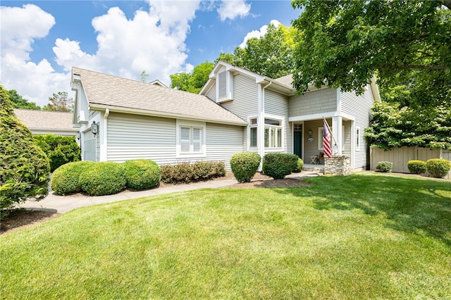10 Bristol View Dr, Perinton, NY 14450 - view of front of house with a shingled roof and a garage