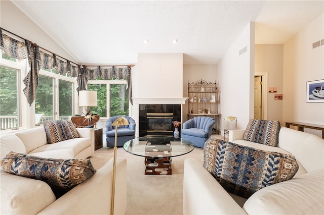10 Bristol View Dr, Perinton, NY 14450 - carpeted living area featuring vaulted ceiling and a tile fireplace