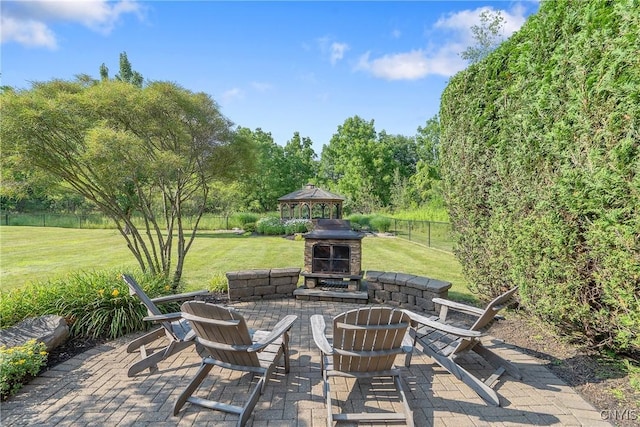 1002 Oreste St, Camillus, NY 13031 - view of patio featuring a gazebo and an outdoor stone fireplace