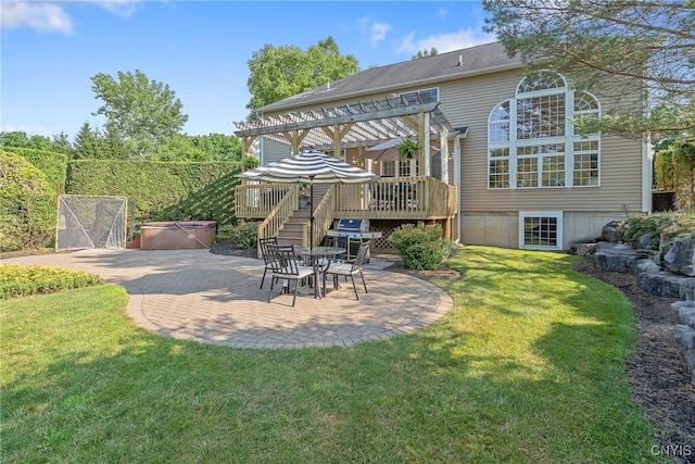 1002 Oreste St, Camillus, NY 13031 - view of grassy yard featuring a hot tub, a pergola, a wooden deck, and a patio area
