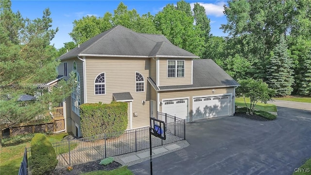 1002 Oreste St, Camillus, NY 13031 - traditional home featuring asphalt driveway