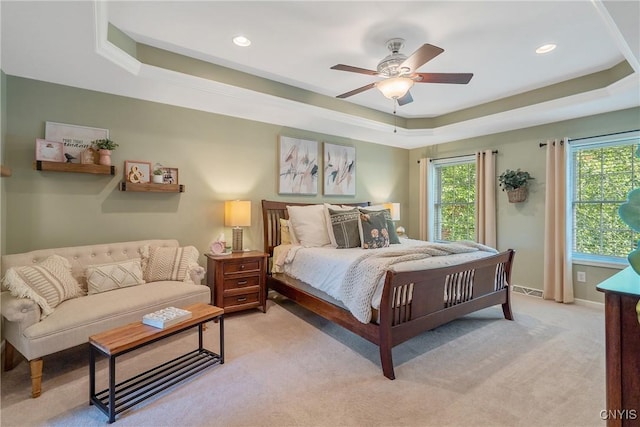 1002 Oreste St, Camillus, NY 13031 - bedroom featuring a raised ceiling, light carpet, recessed lighting, and ceiling fan