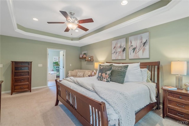 1002 Oreste St, Camillus, NY 13031 - bedroom with a tray ceiling, light carpet, recessed lighting, ensuite bath, and ceiling fan