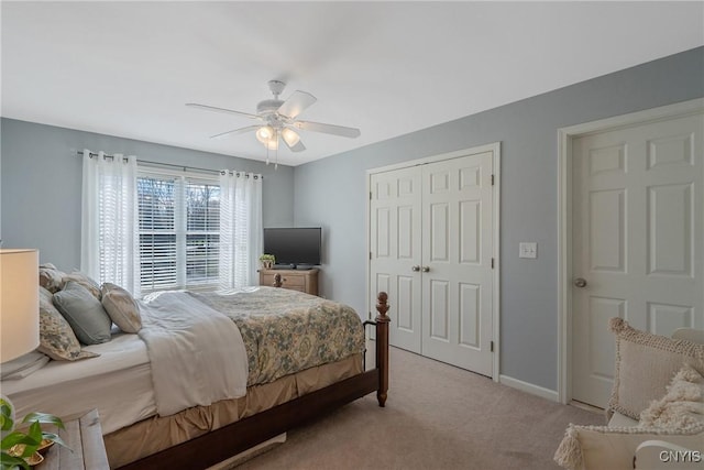 1002 Oreste St, Camillus, NY 13031 - bedroom featuring light carpet, a closet, and ceiling fan
