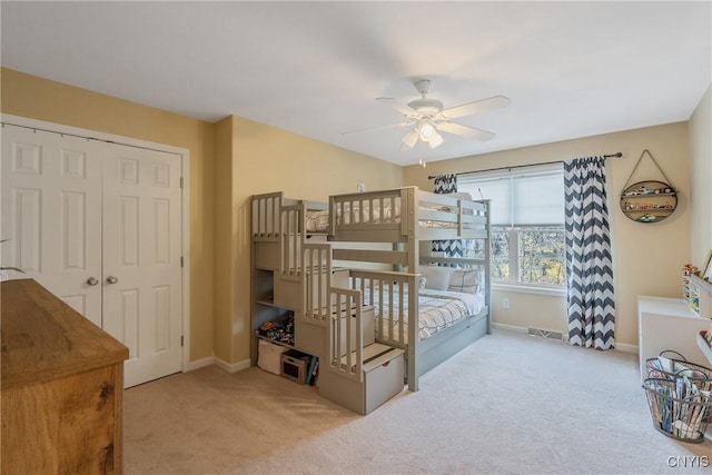 1002 Oreste St, Camillus, NY 13031 - carpeted bedroom featuring a closet and a ceiling fan